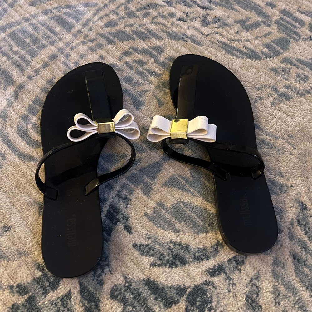 Black Melissa flip flops